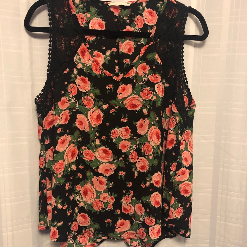 Floral sleeveless top.
